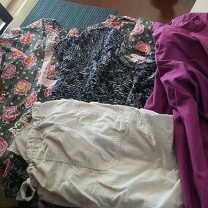 2 koi tops 1 koi pants and a jacket